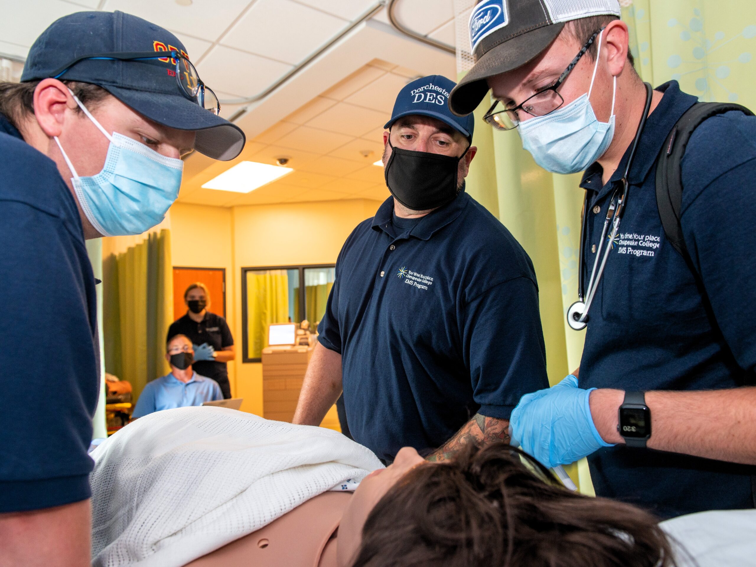 EMS students and instructor conducting a simulation.