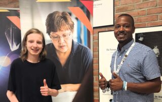 David Irby and a high school student during an open house at which he represented the college's skilled trades program