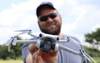 man holding drone